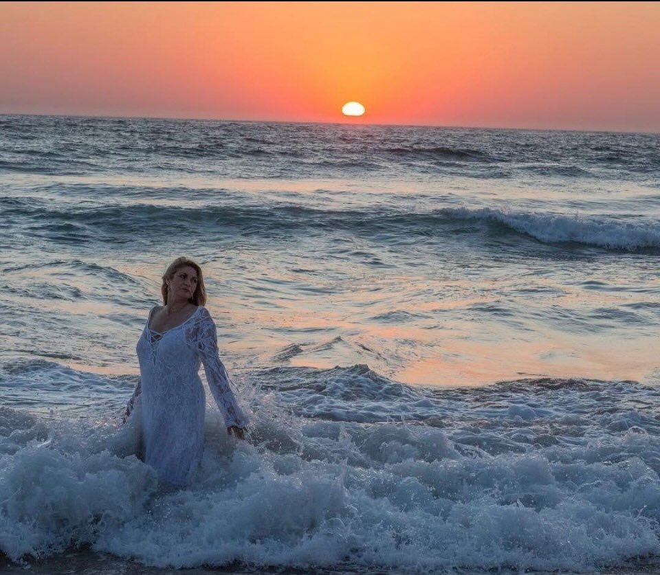 Maria Therase in the sea at sunset